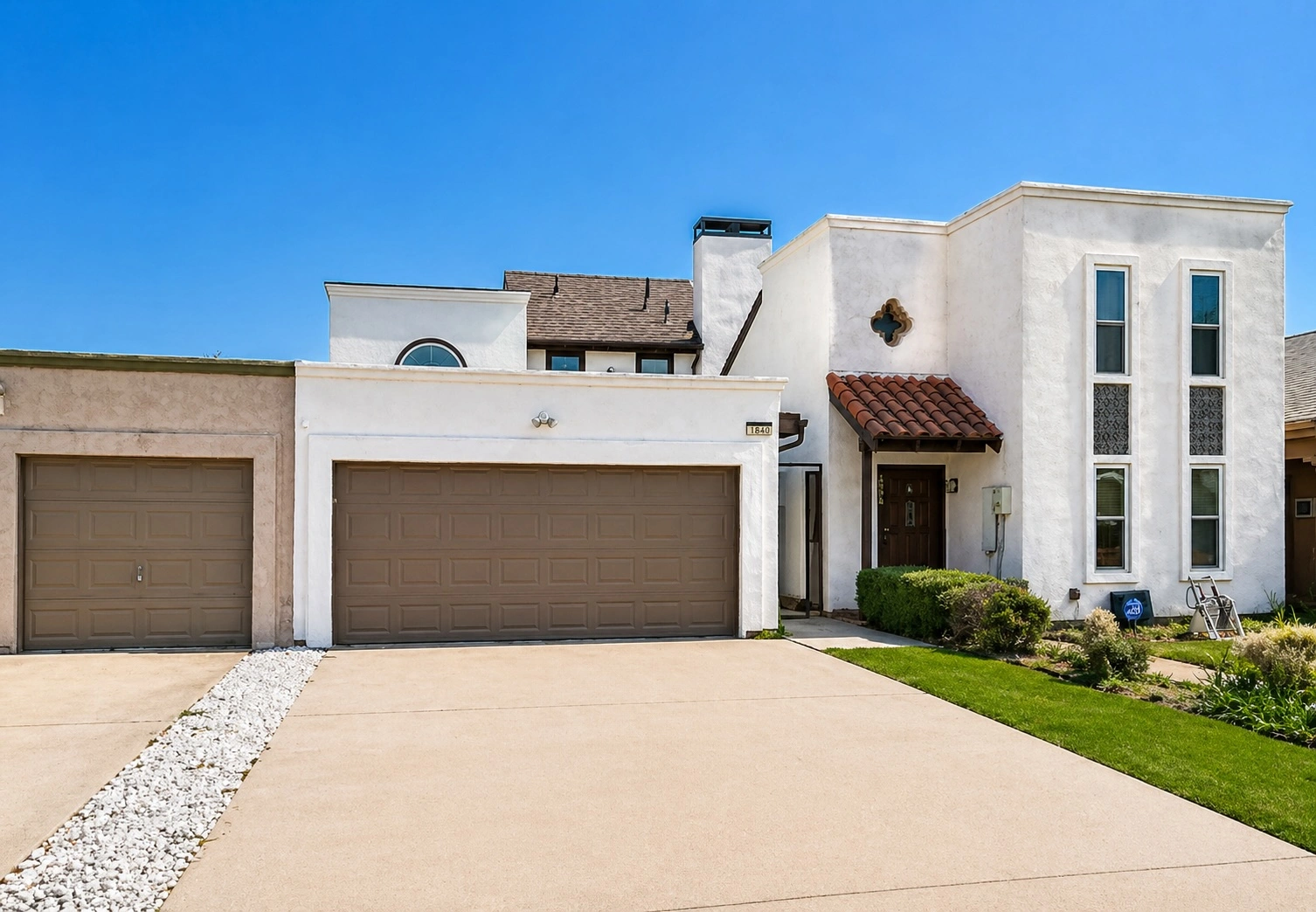 Same home exterior after professional repaint